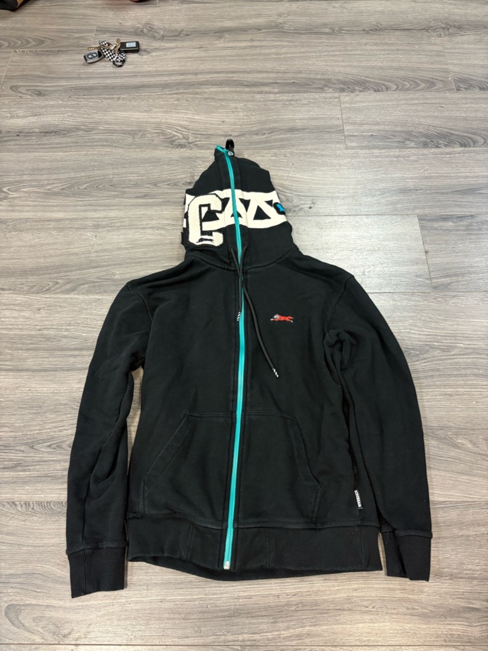 Ice cream Black Zip-Up Hoodie with Teal Zipper and Cream Hood Detail